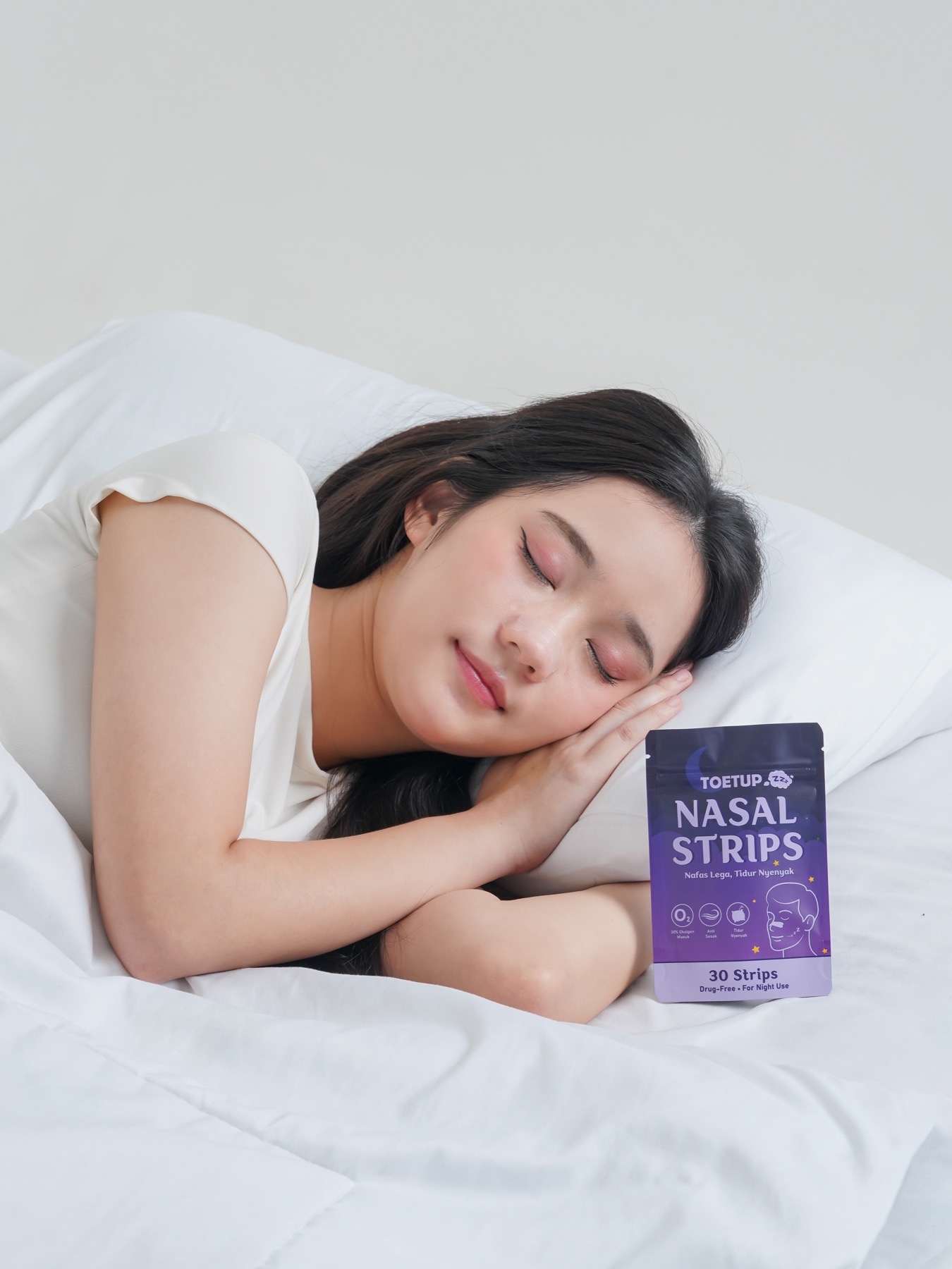 Pengguna tidur nyenyak dengan TOETUP Sleep Edition